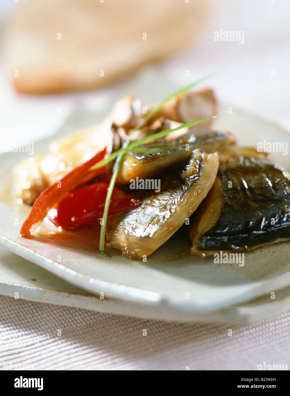 Gedünsteter Fisch mit Gemüse Stockfoto