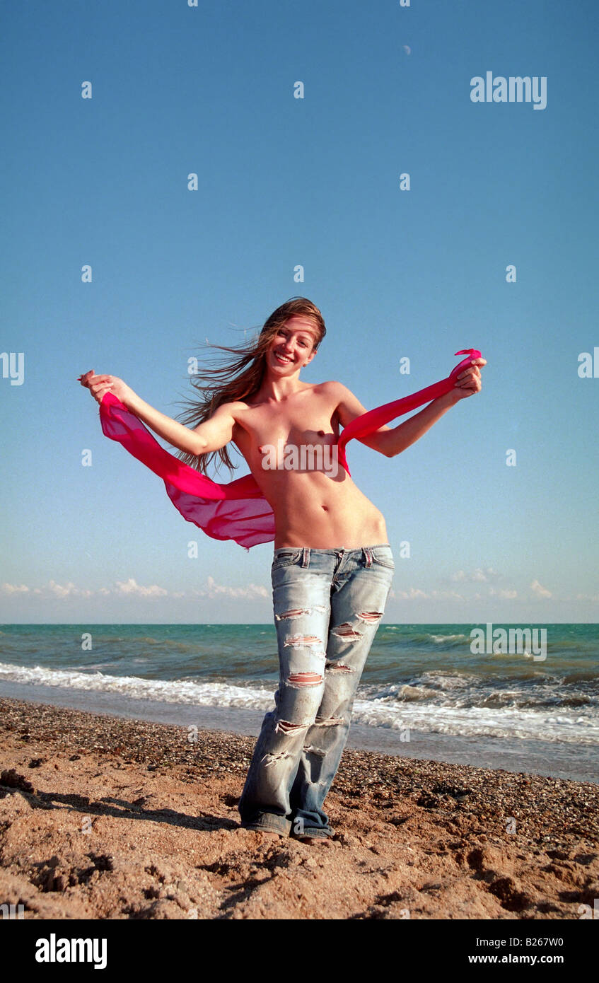 nackte Frau am Strand Stockfoto
