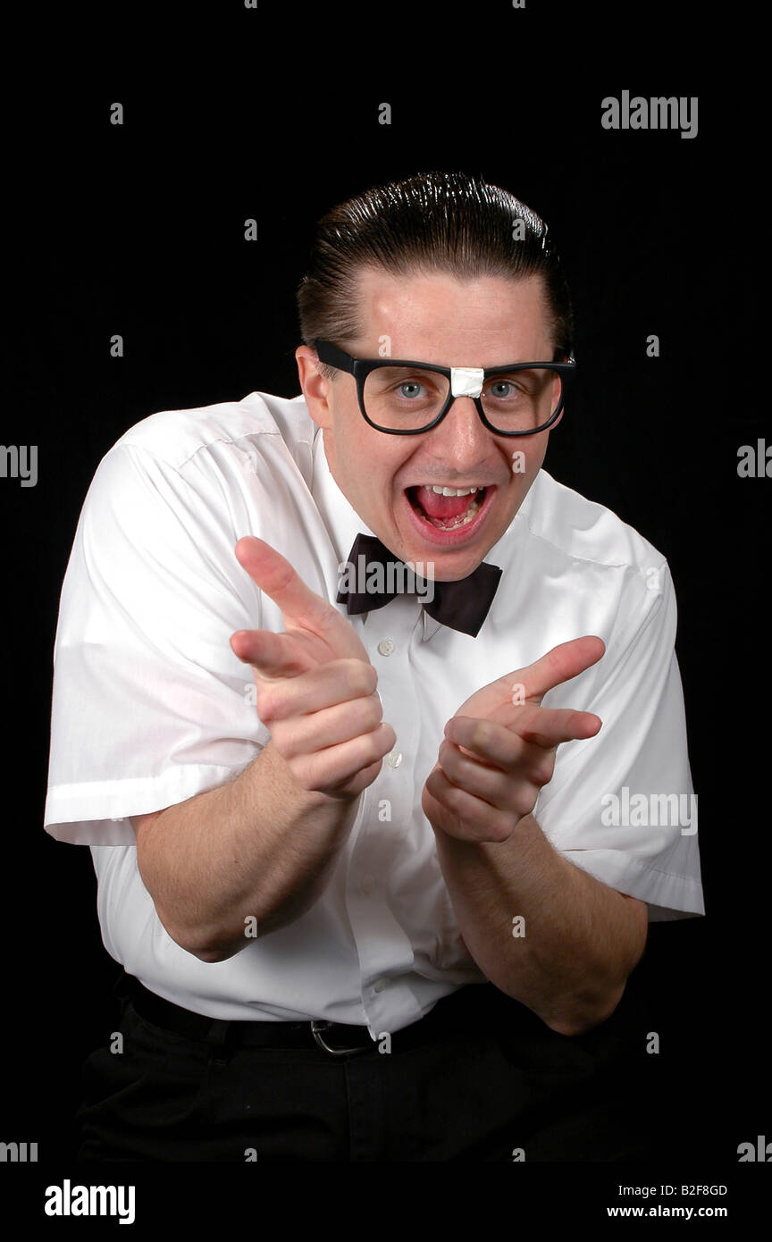 Nerd mit Finger zeigen mit dem Ausdruck ihrer Freude Stockfoto