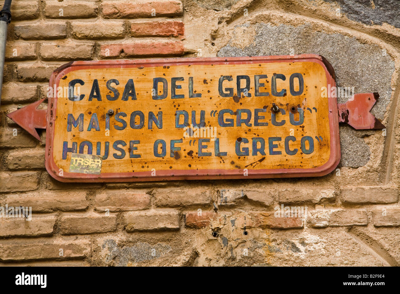 Spanien Toledo Schild mit Pfeil nach dem Haus Greco in Englisch und Spanisch und Französisch Stockfoto