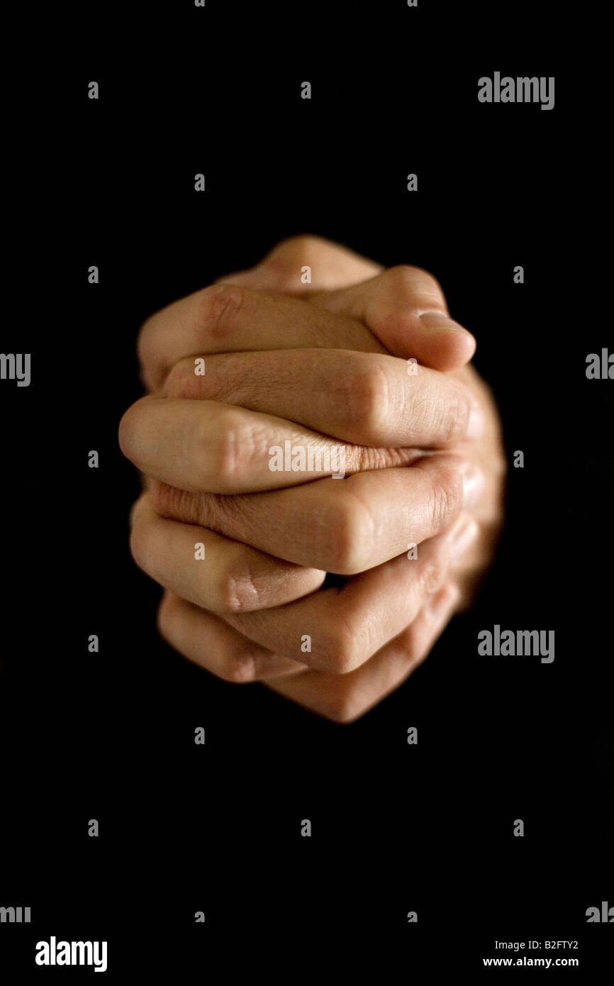 Hände zusammen gehalten, als ob beten. Stockfoto
