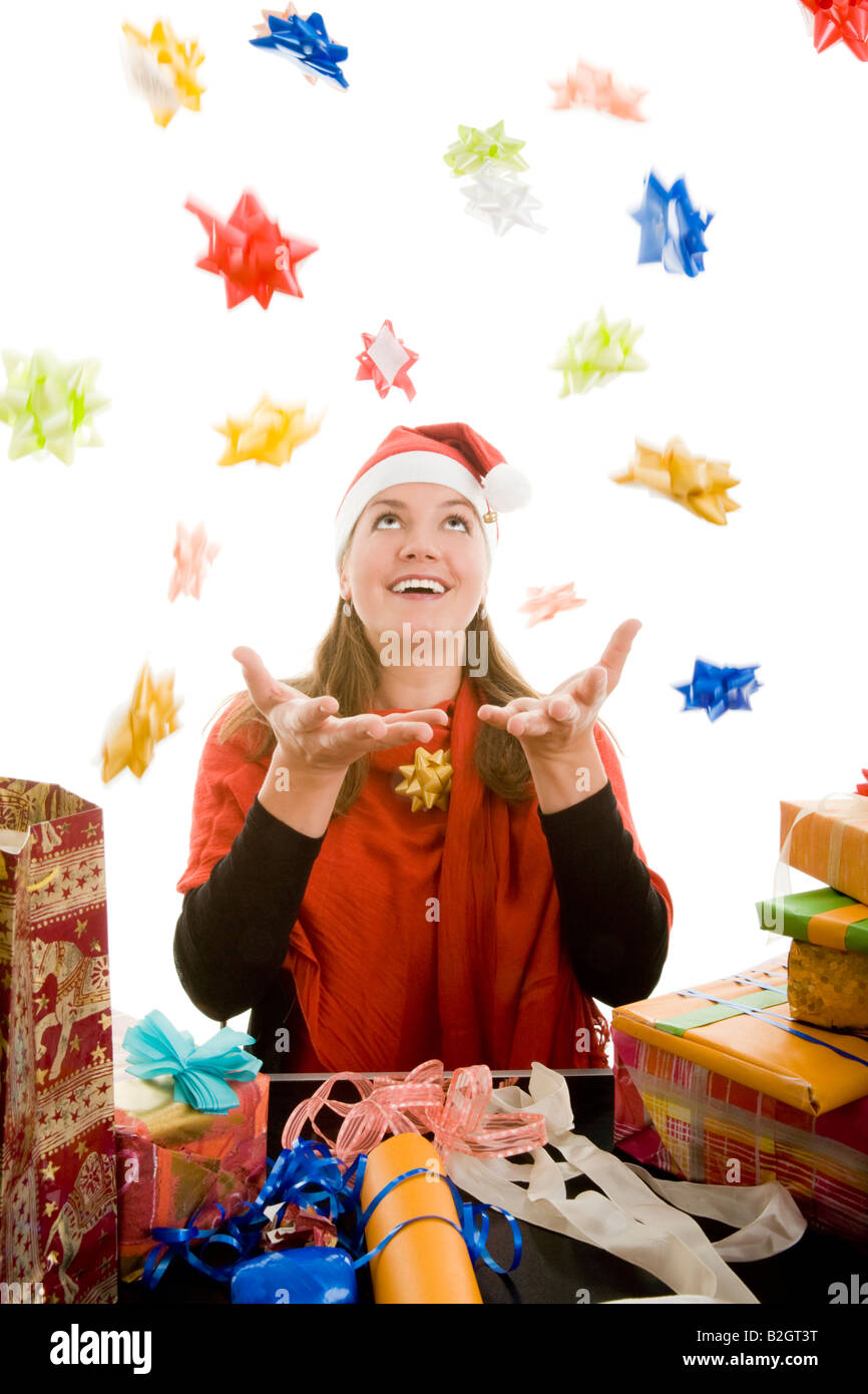 Xmas Weihnachten Geschenke Sterne glücklich Spaß lustige Party junge Frau Stockfoto