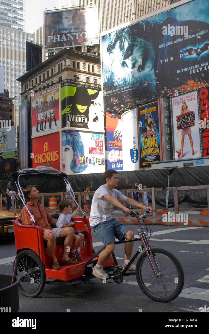 Rikscha-Fahrer auf dem Times Square in New York Stockfoto