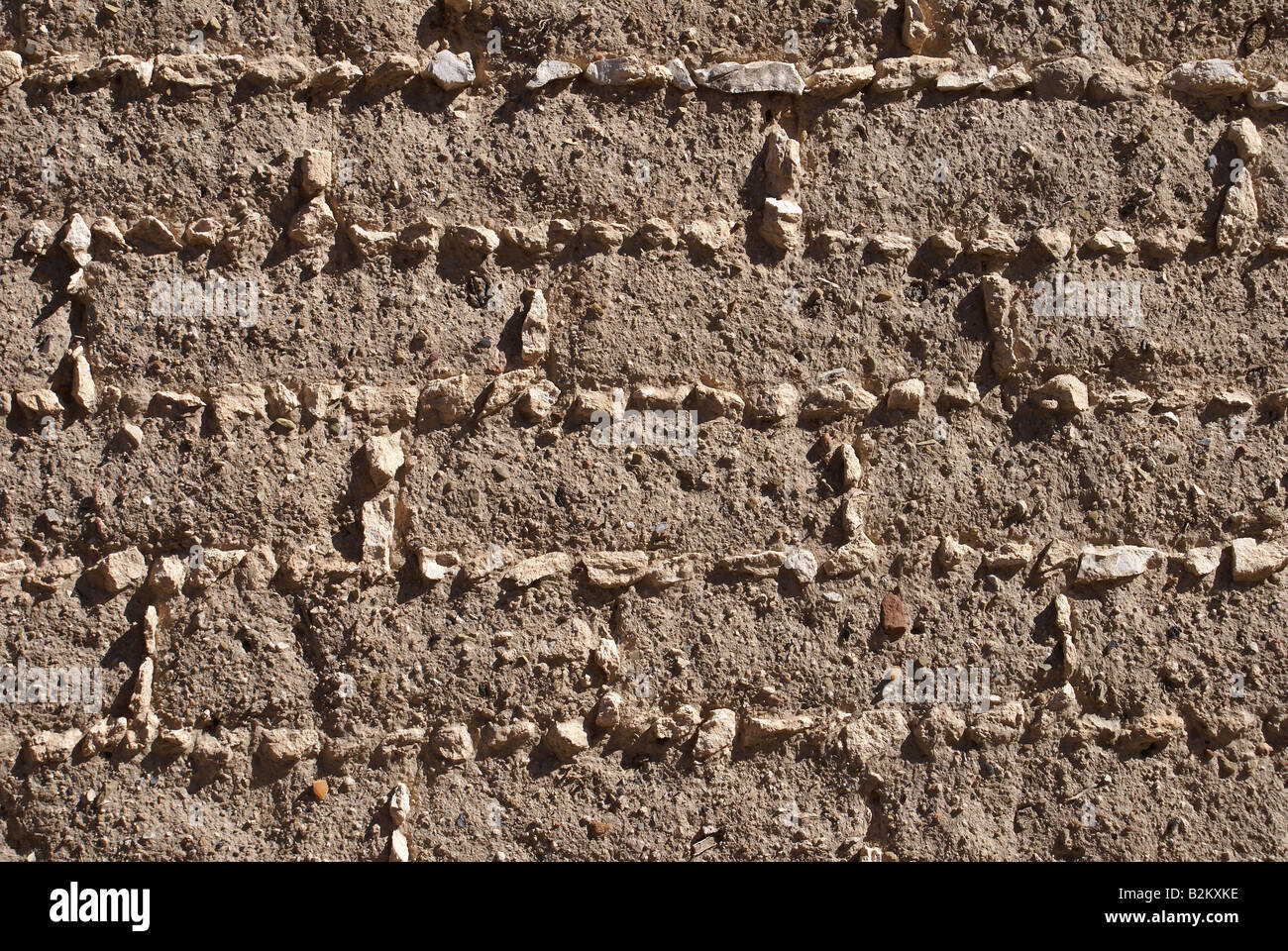 Struktur und Muster in eine Adobe-Mauer Stockfoto