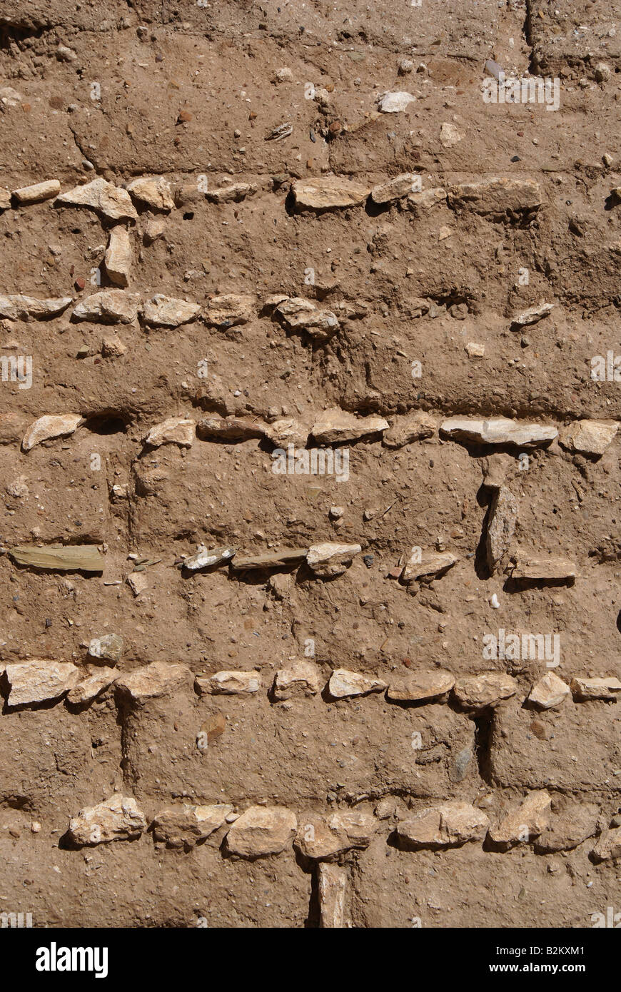 Struktur und Muster in eine Adobe-Mauer Stockfoto