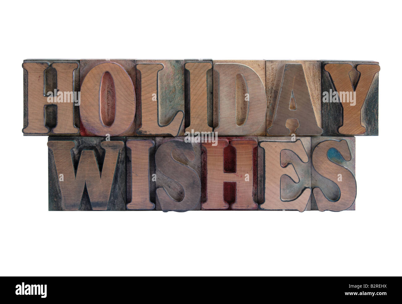 Geben Sie die Worte "Urlaubsgrüße" in altem, blau gefärbten Holz Stockfoto
