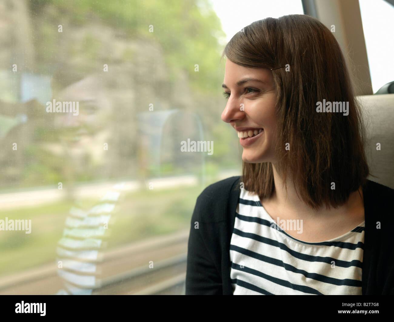 Frau im Zug Stockfoto