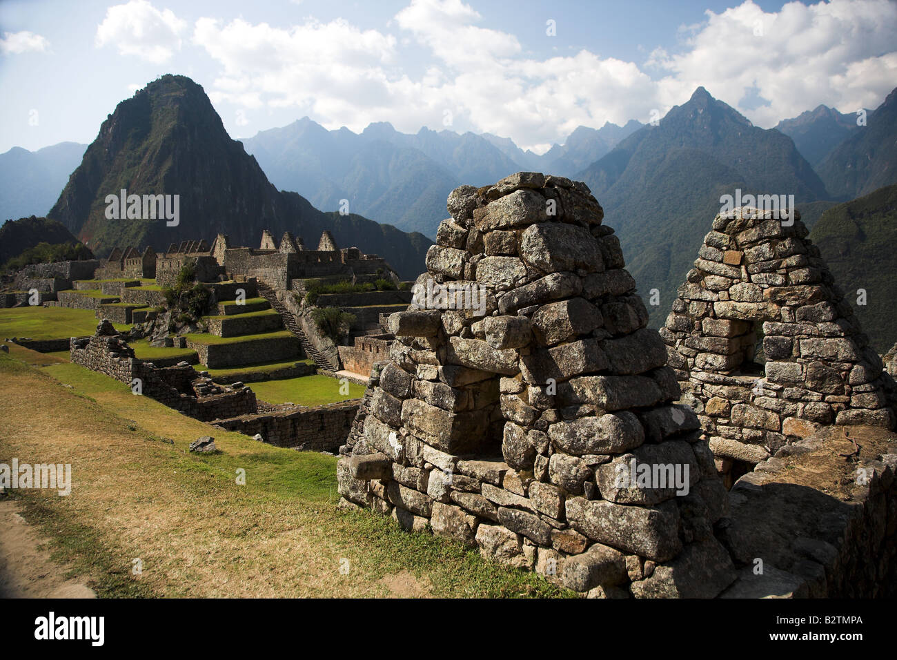 Inkaruinen Machu Picchu und montieren Huayna Picchu, am nächsten an der Stadt von Aguas Calientes in Peru. Stockfoto