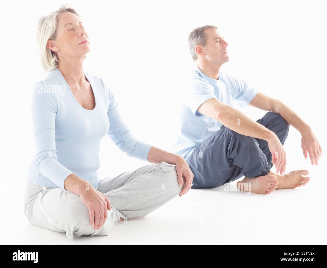 Älteres Paar beim yoga Stockfoto