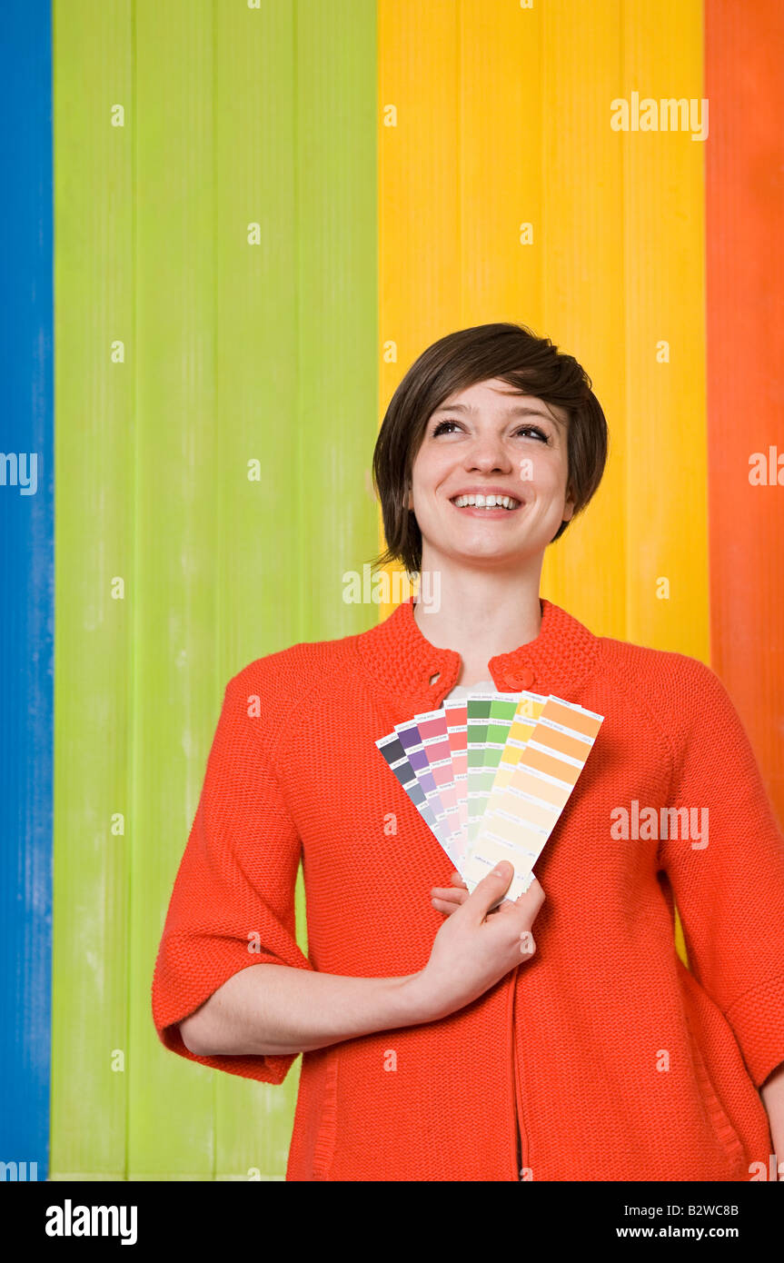 Junge Frau mit Farben Stockfoto