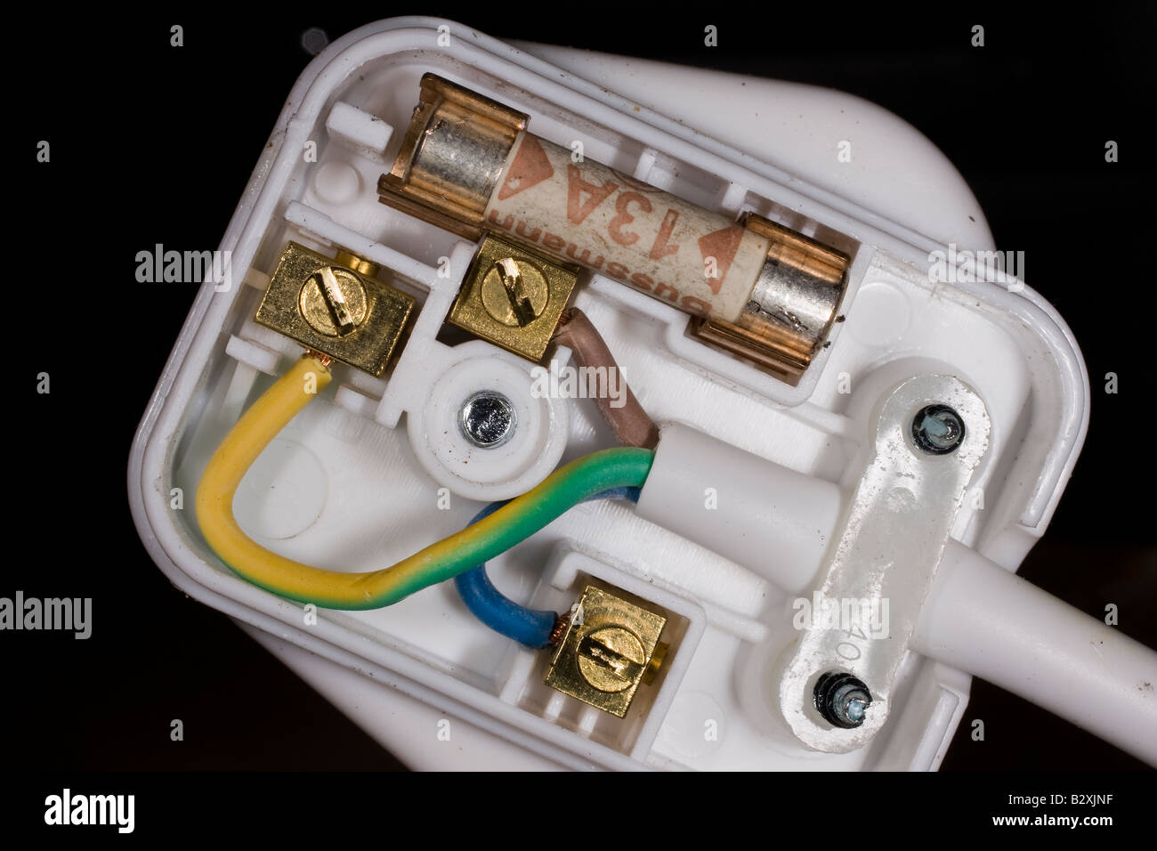 13 Amp Stecker mit Top entfernt mit Sicherung und Kabelverbindungen. Stockfoto