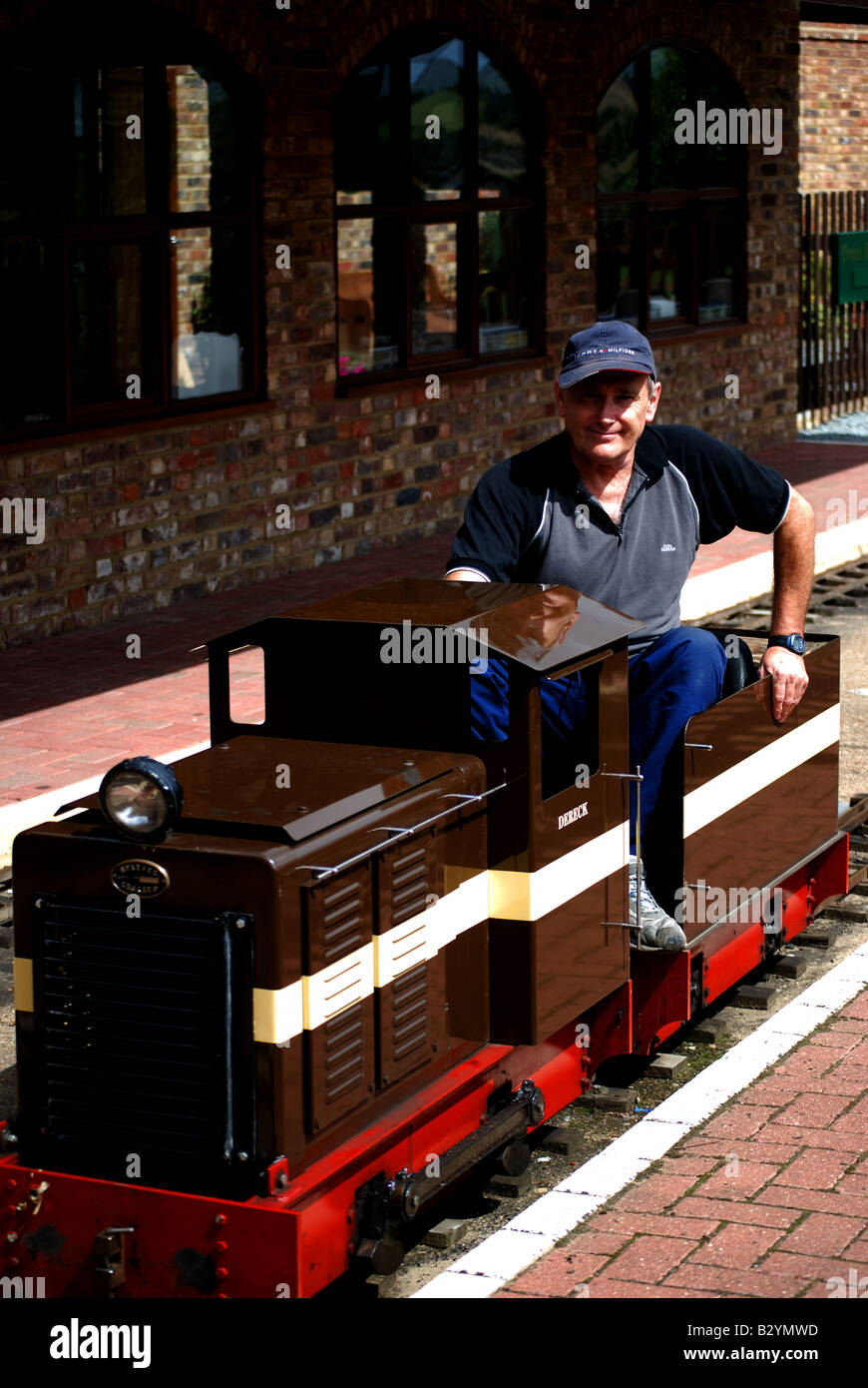 Männer und ihre Spielzeuge Stockfoto