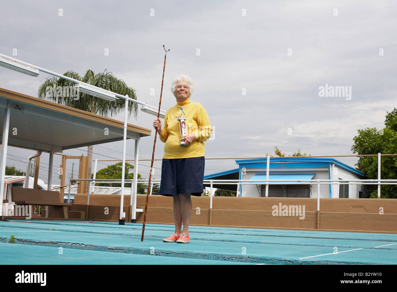 Porträt von Shuffleboard Champion, Florida, USA Stockfoto