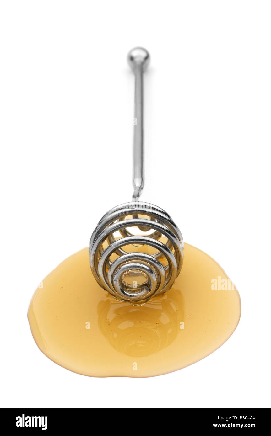 Klarer Honig auf drizzler Stockfoto