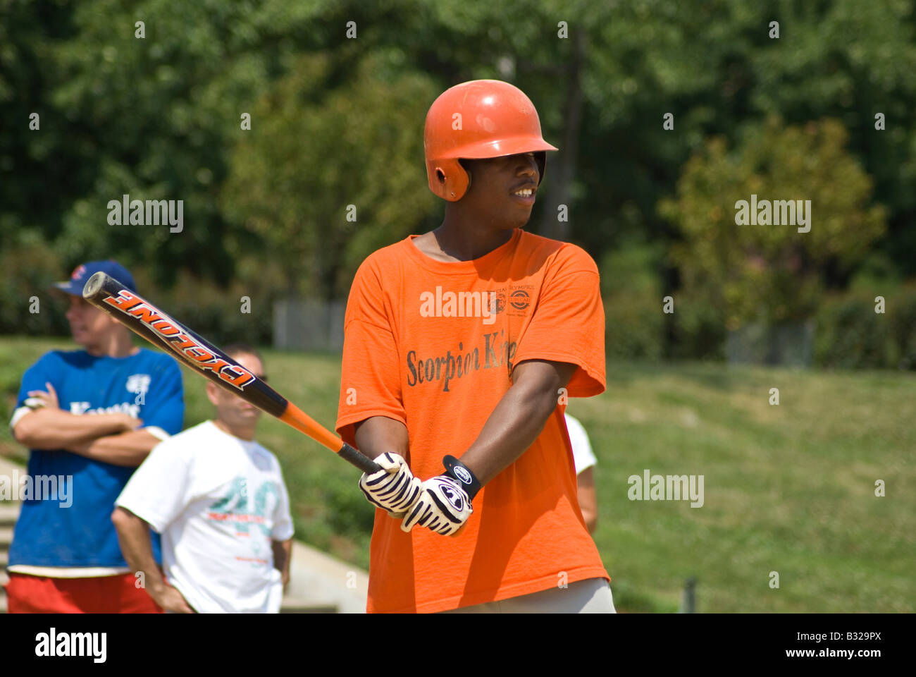 Junger Mann an bat bei einem Special Olympics-Softball-Turnier Stockfoto