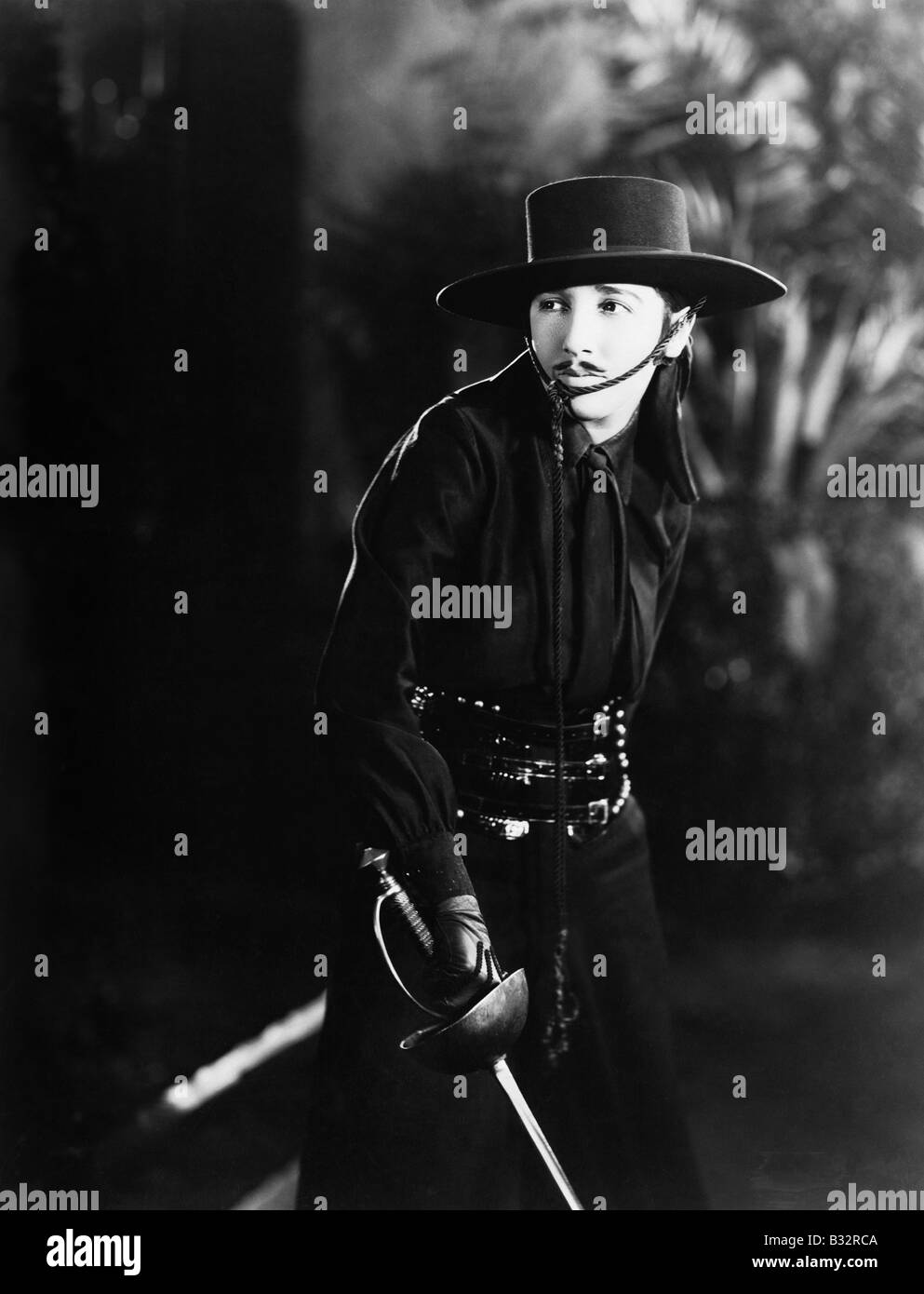 Frau als Zorro Stockfoto