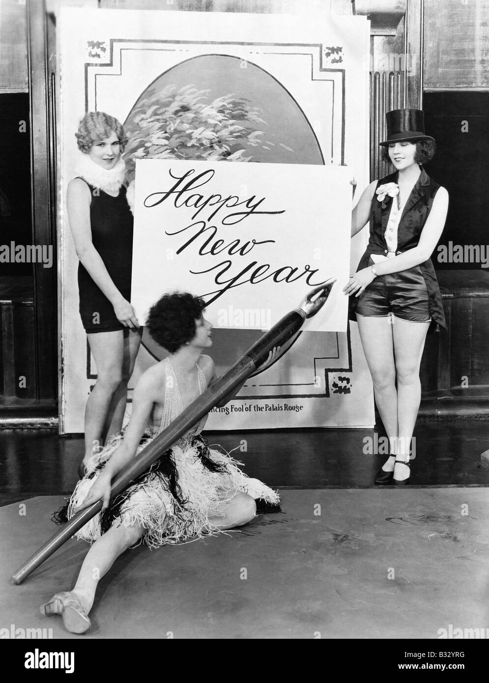 Frauen, Happy New Year mit riesigen Stift Stockfoto