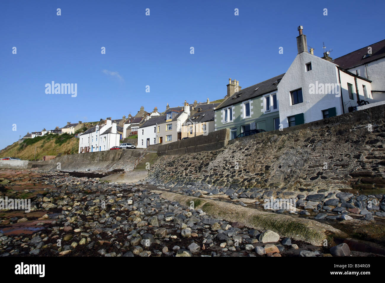 Ehemaliges Fischerdorf und den Hafen von Gardenstown an der Nordküste in Aberdeenshire, Schottland, Vereinigtes Königreich Stockfoto