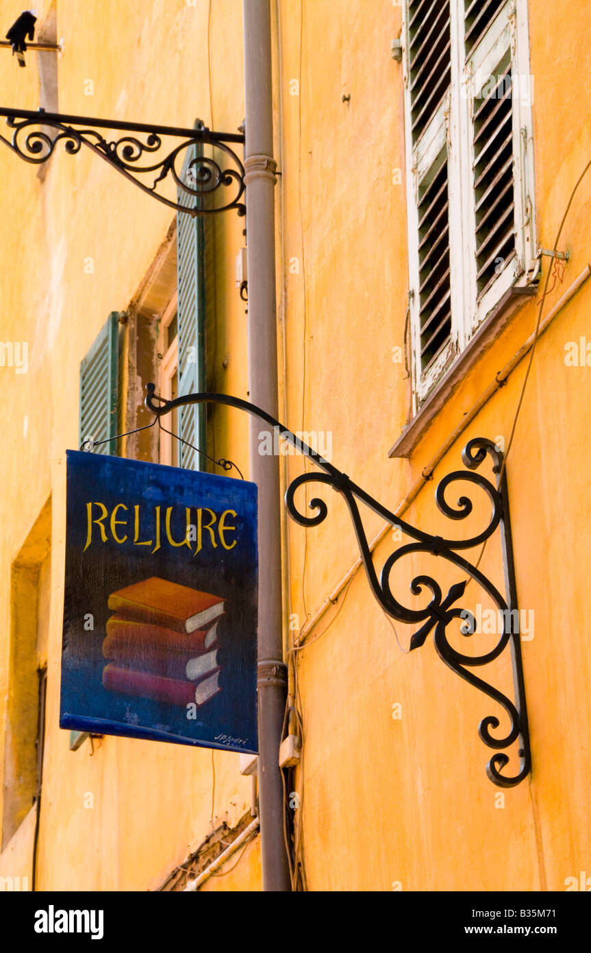 ein Shop-Zeichen an der Wand eine alte Gebäude, die Altstadt von Nizza, Côte d ' Azur, Frankreich Stockfoto