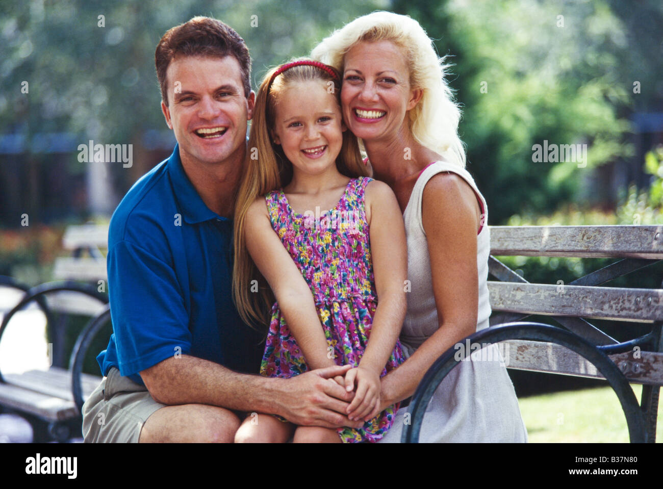 Familie sitzen im Park zusammen, Portrait, Miami Stockfoto