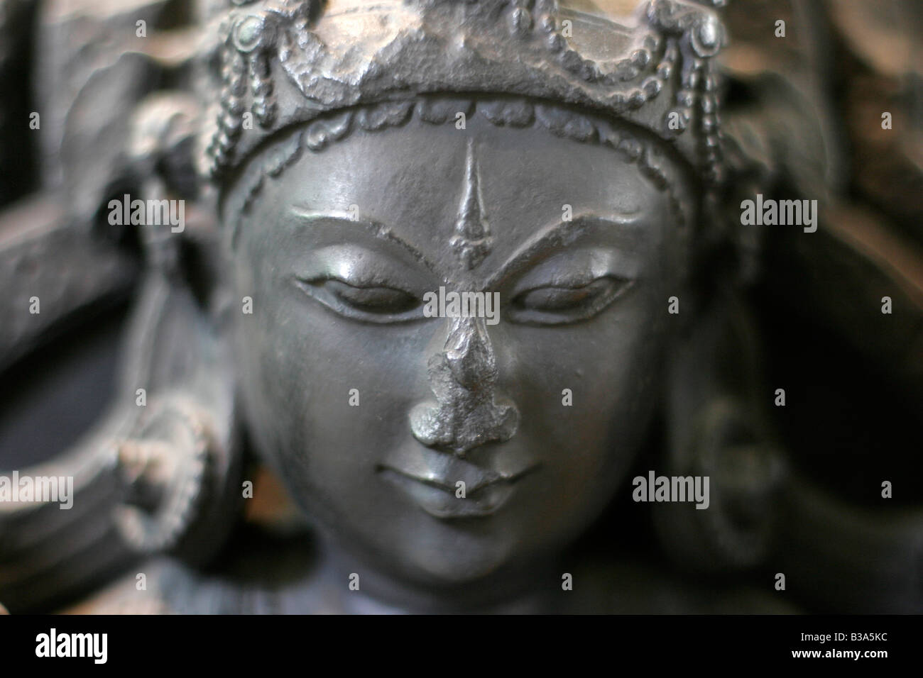 Gesicht der indischen Göttin Lalita auf einer Statue an das British Museum in London Stockfoto