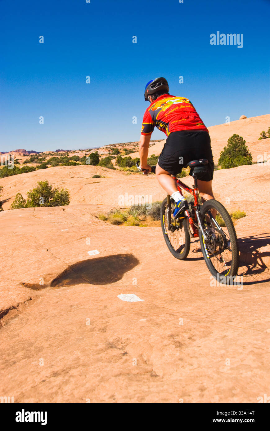 Mountainbiker fahren den Slickrock Radweg aus Moab Utah Stockfoto