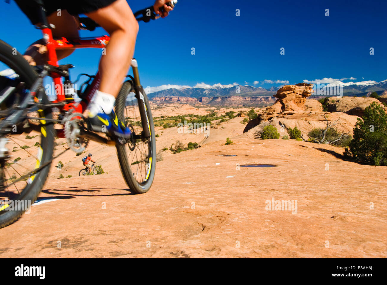 Mountainbiker fahren den Slickrock Radweg aus Moab Utah Stockfoto