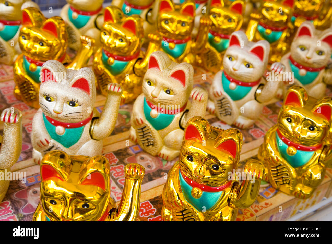 Maneki Neko - glückliche Katze Stockfoto