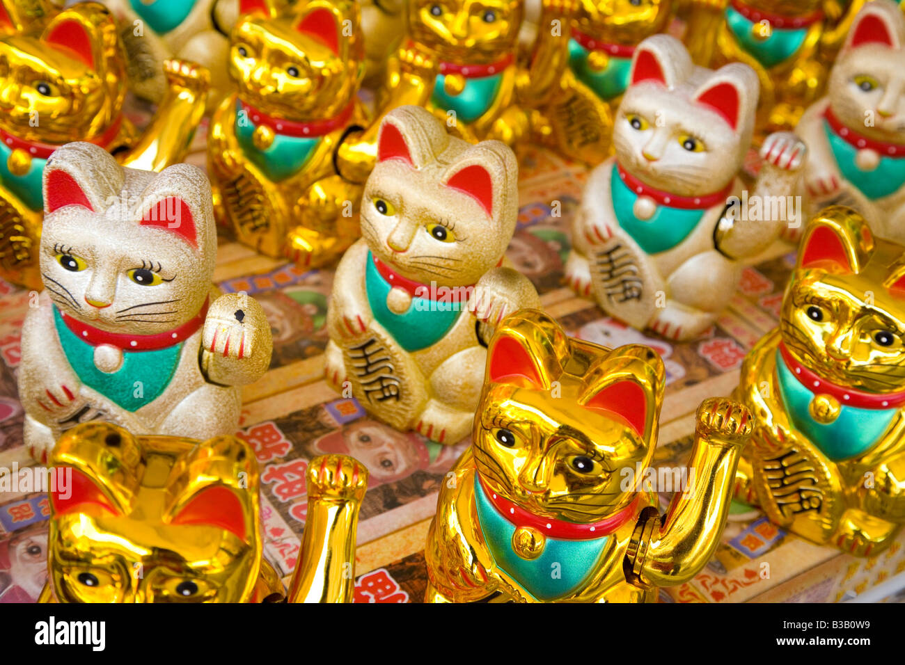 Maneki Neko - glückliche Katzen Stockfoto