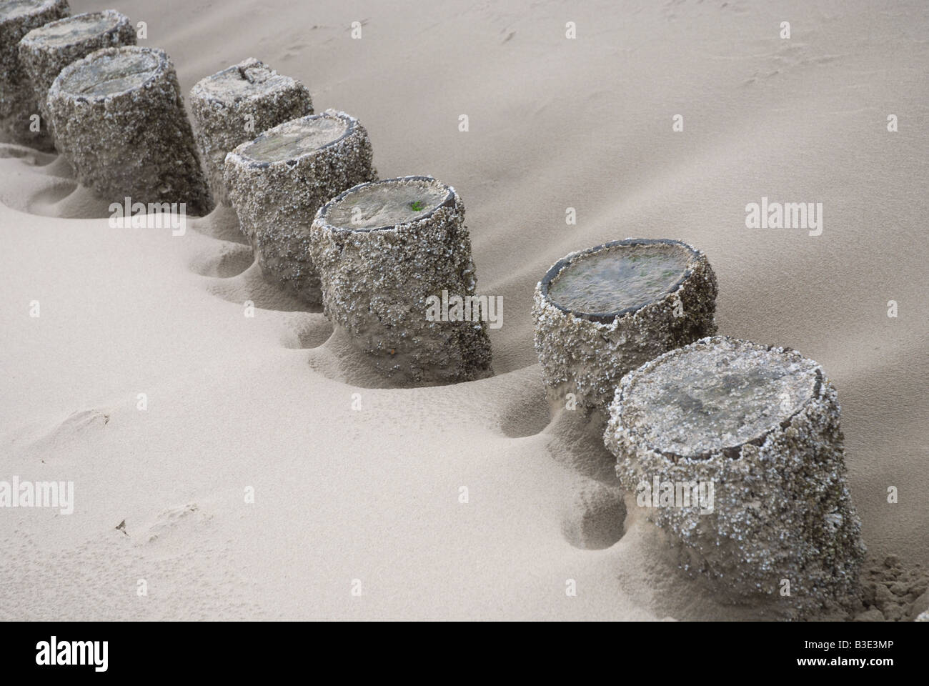 Wellenbrecher und Strand-detail Stockfoto