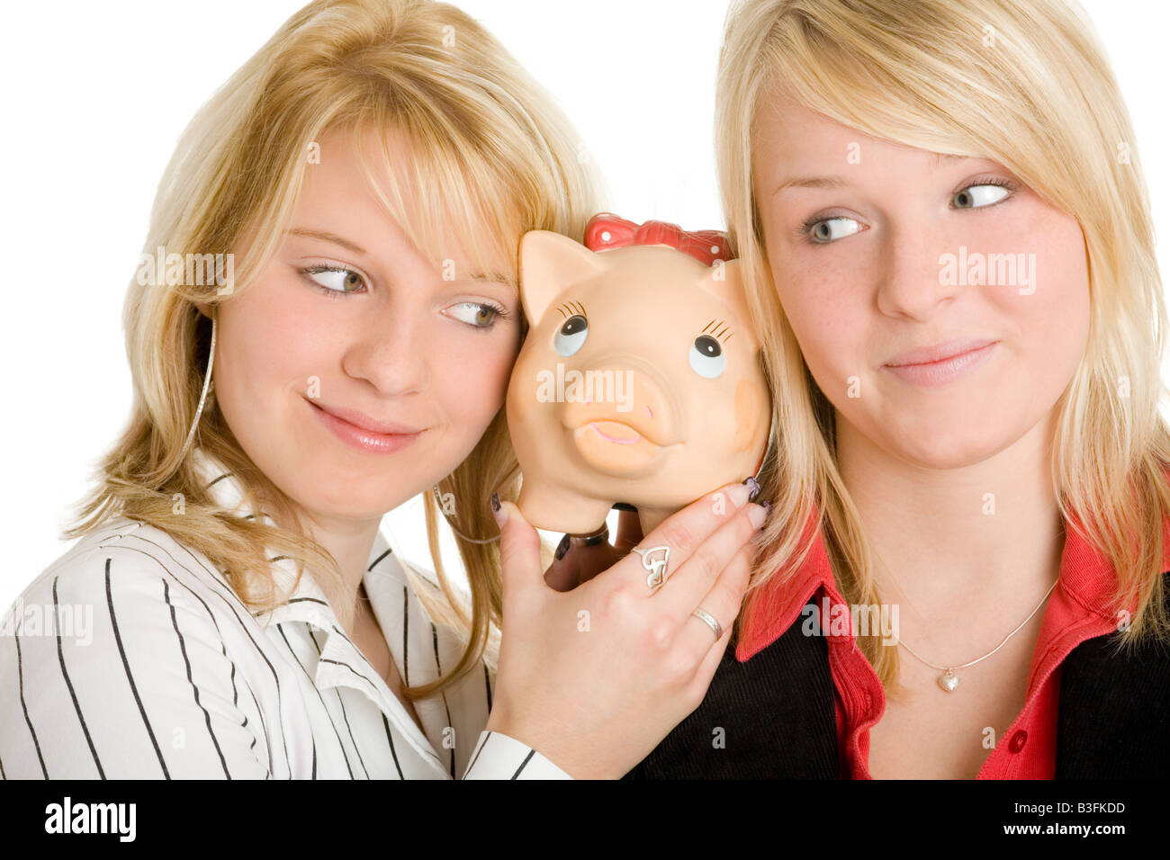 Mädchen mit Sparschwein Stockfoto