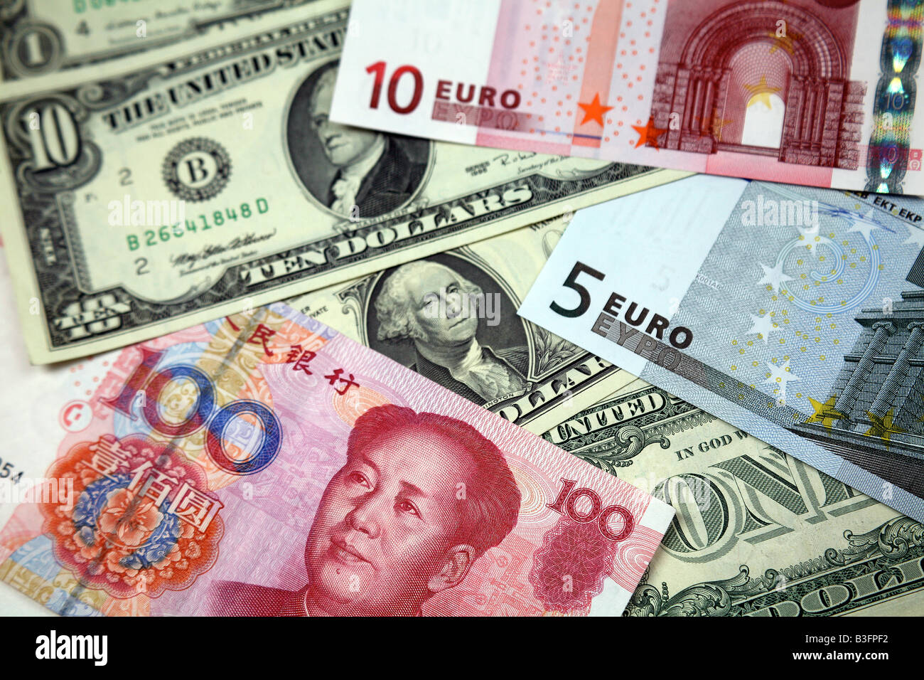 Chinesische, amerikanische und europäische Papiergeld-Währung Stockfoto