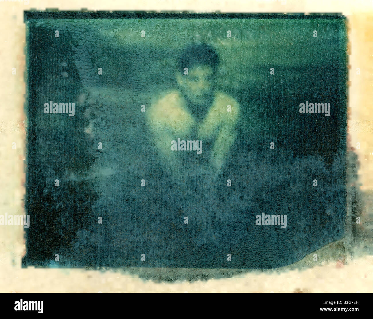 eindrucksvollen künstlerischen Fotografie eines jungen Mannes ohne Hemd Stockfoto