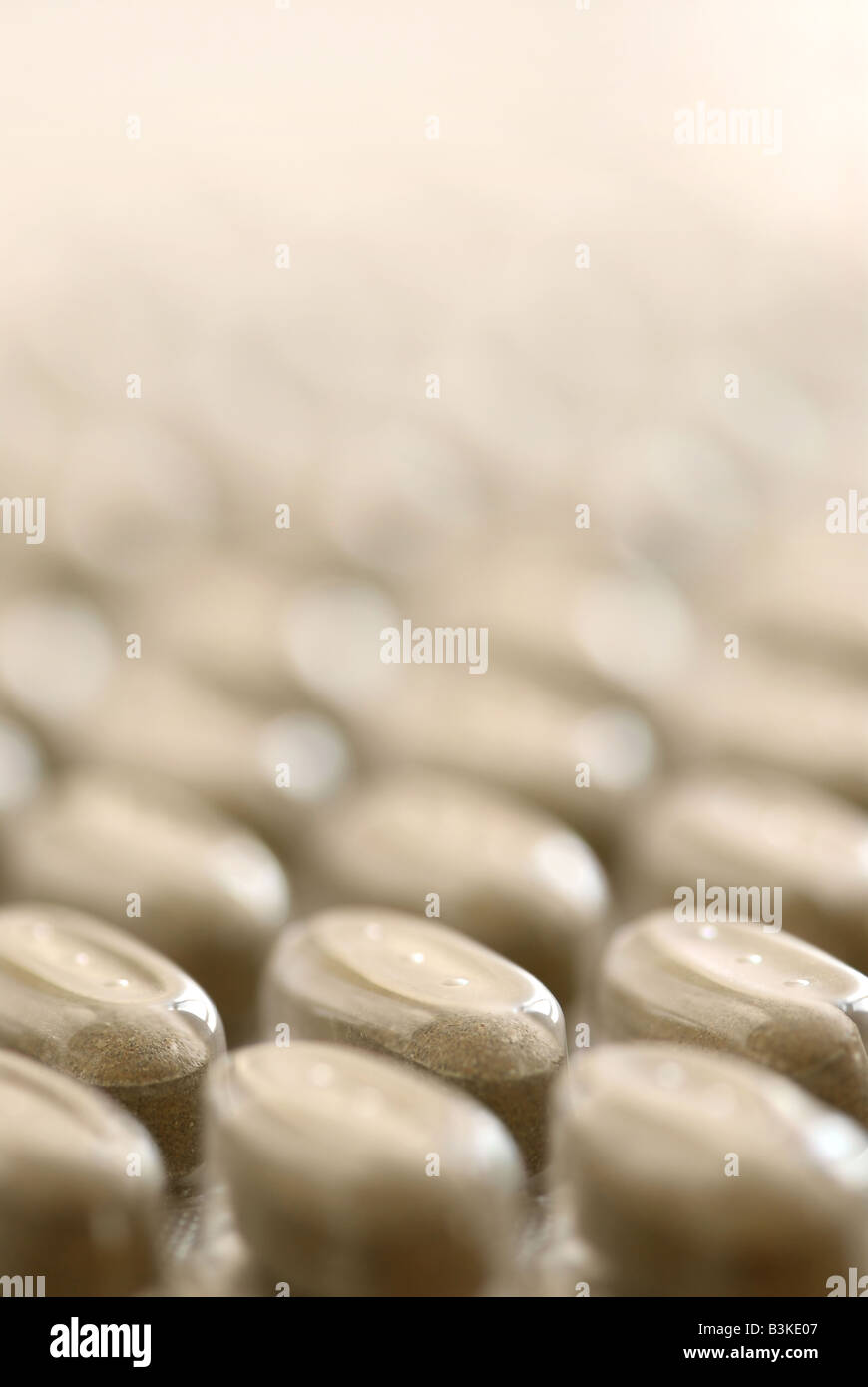Hintergrund der Kräuterergänzung Pillen hautnah Stockfoto