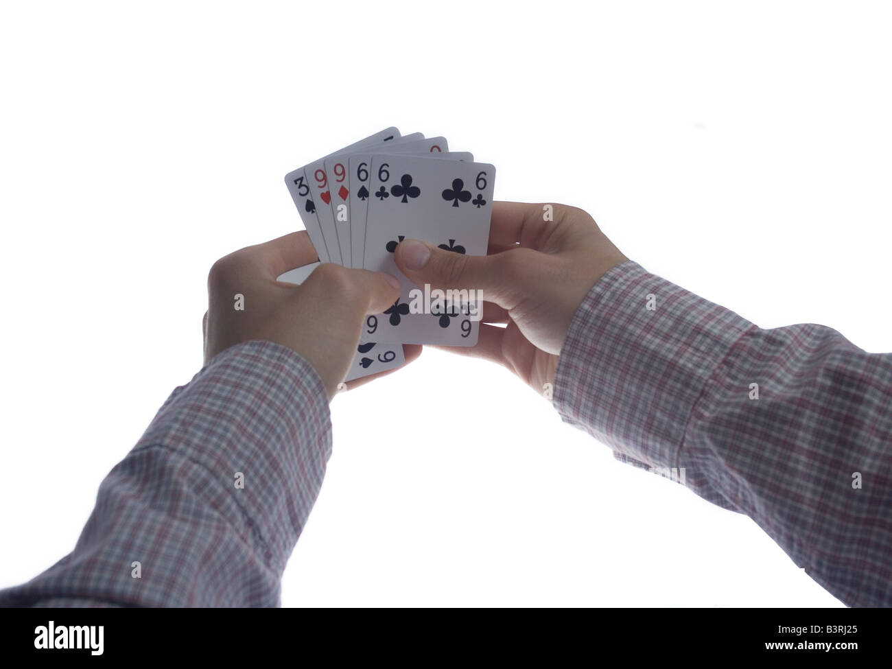 Mann beim Poker betrügen Stockfoto