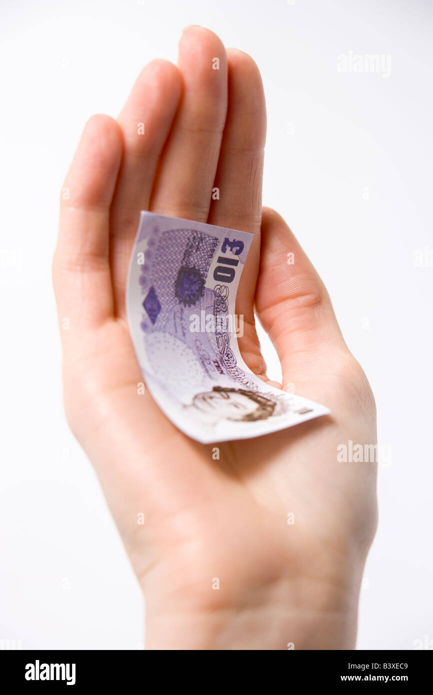 Handvoll Geld Stockfoto