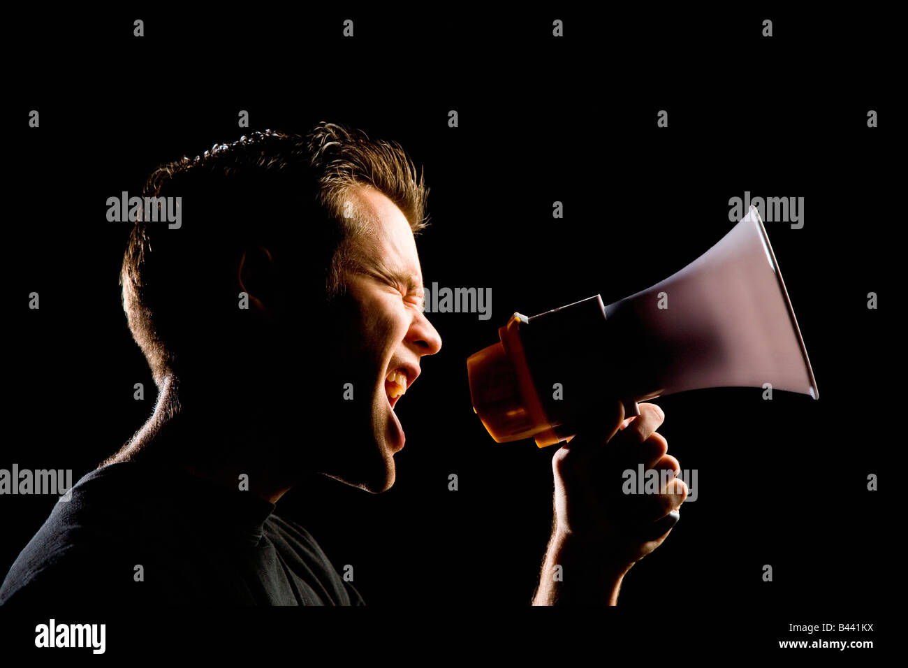 Mann mit Megaphon Stockfoto