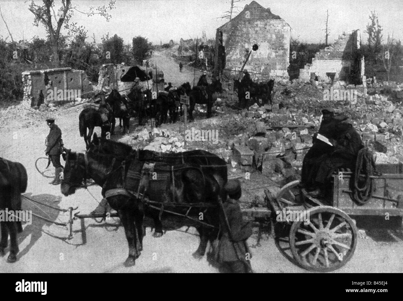 German cavalry of the First World War and their supply wagons in the destroyed city of Lassigny, France, 1918