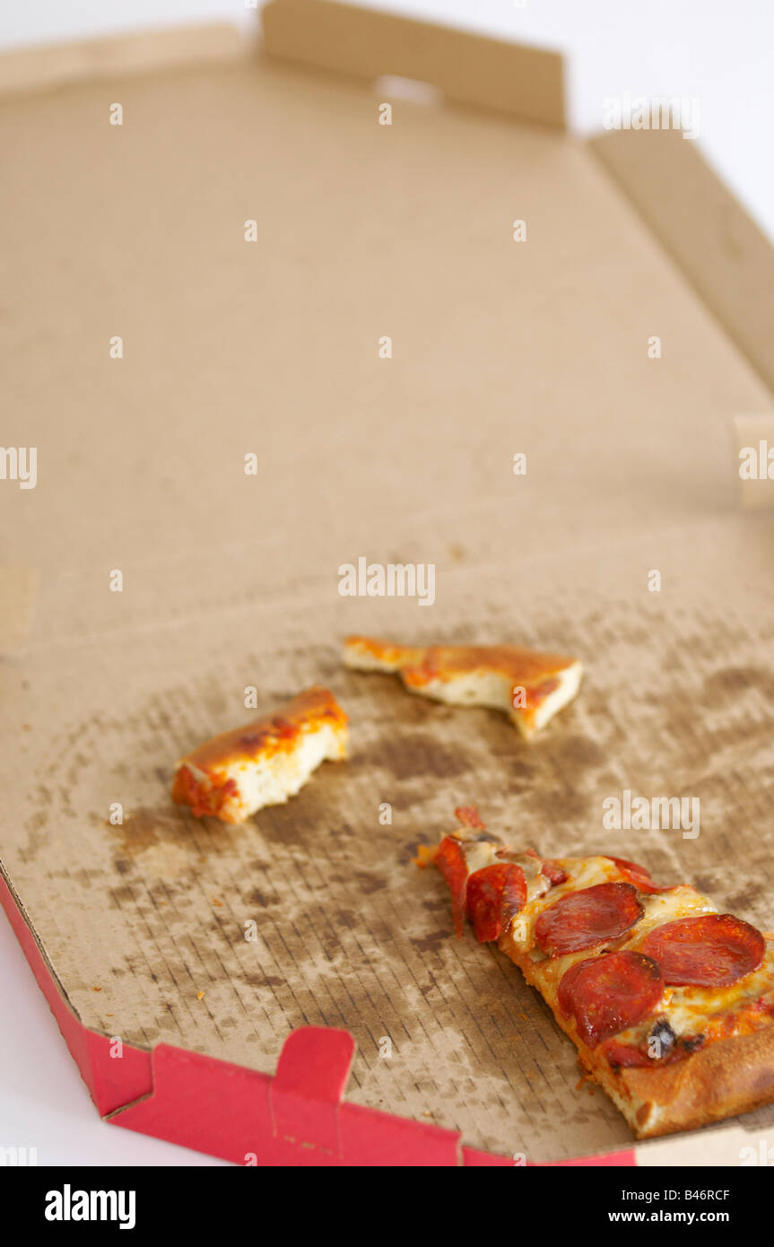 Stück Pizza in Box Stockfoto