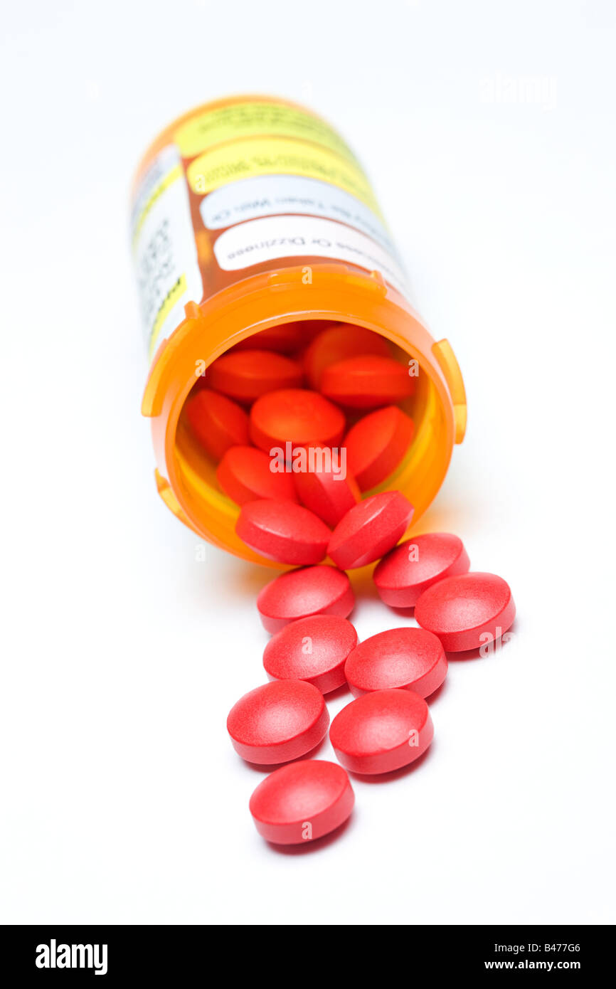 Tabletten aus einer Flasche Stockfoto