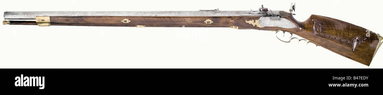 Ein linkes, rückwärtiger Fliessschlauchgewehr, Joseph von Klebelsberg, Bolzano, um 1800. Schwerer Damaszener Lauf mit mehreren Rillen im 17-mm-Kaliber mit einem gedämmten Vorderblick und verstellbarem Heckschürfensicht. Messingmarkierung auf der Breech. Eine linke Blintschleuse mit Inneneinrichtung. Trigger setzen (defekt). Die Schlossplatte ist signiert: "Joseph von Klebelsberg in Botzen". Gemeißelter Nussbaum Vollstock mit Messingmöbeln. Originale Holzstange mit Messingspitze und Kugelabzieher. Länge 128 cm. Enthält das Buch "die Schützenvereine von Oberbozen", Stuttgart 199, Stockfoto
