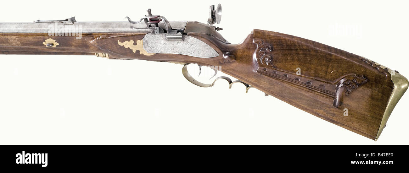 Ein linkes, rückwärtiger Fliessschlauchgewehr, Joseph von Klebelsberg, Bolzano, um 1800. Schwerer Damaszener Lauf mit mehreren Rillen im 17-mm-Kaliber mit einem gedämmten Vorderblick und verstellbarem Heckschürfensicht. Messingmarkierung auf der Breech. Eine linke Blintschleuse mit Inneneinrichtung. Trigger setzen (defekt). Die Schlossplatte ist signiert: "Joseph von Klebelsberg in Botzen". Gemeißelter Nussbaum Vollstock mit Messingmöbeln. Originale Holzstange mit Messingspitze und Kugelabzieher. Länge 128 cm. Enthält das Buch "die Schützenvereine von Oberbozen", Stuttgart 199, Stockfoto