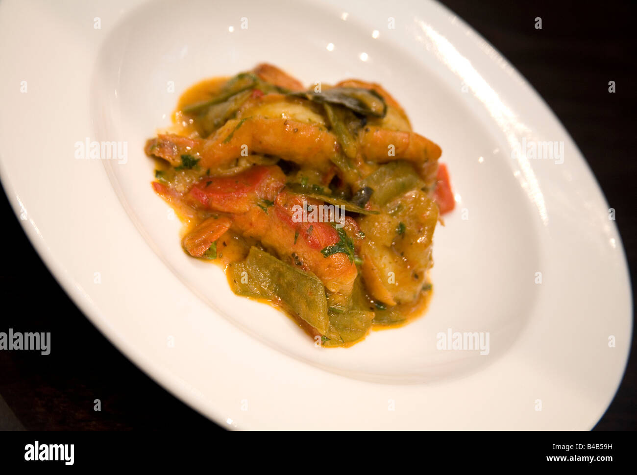 Malaysische rote Garnelecurry Stockfoto