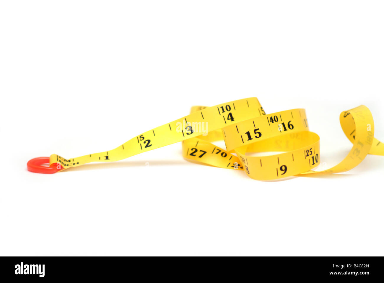 gelbe Measuremet Klebeband isoliert auf weißem Hintergrund Stockfoto