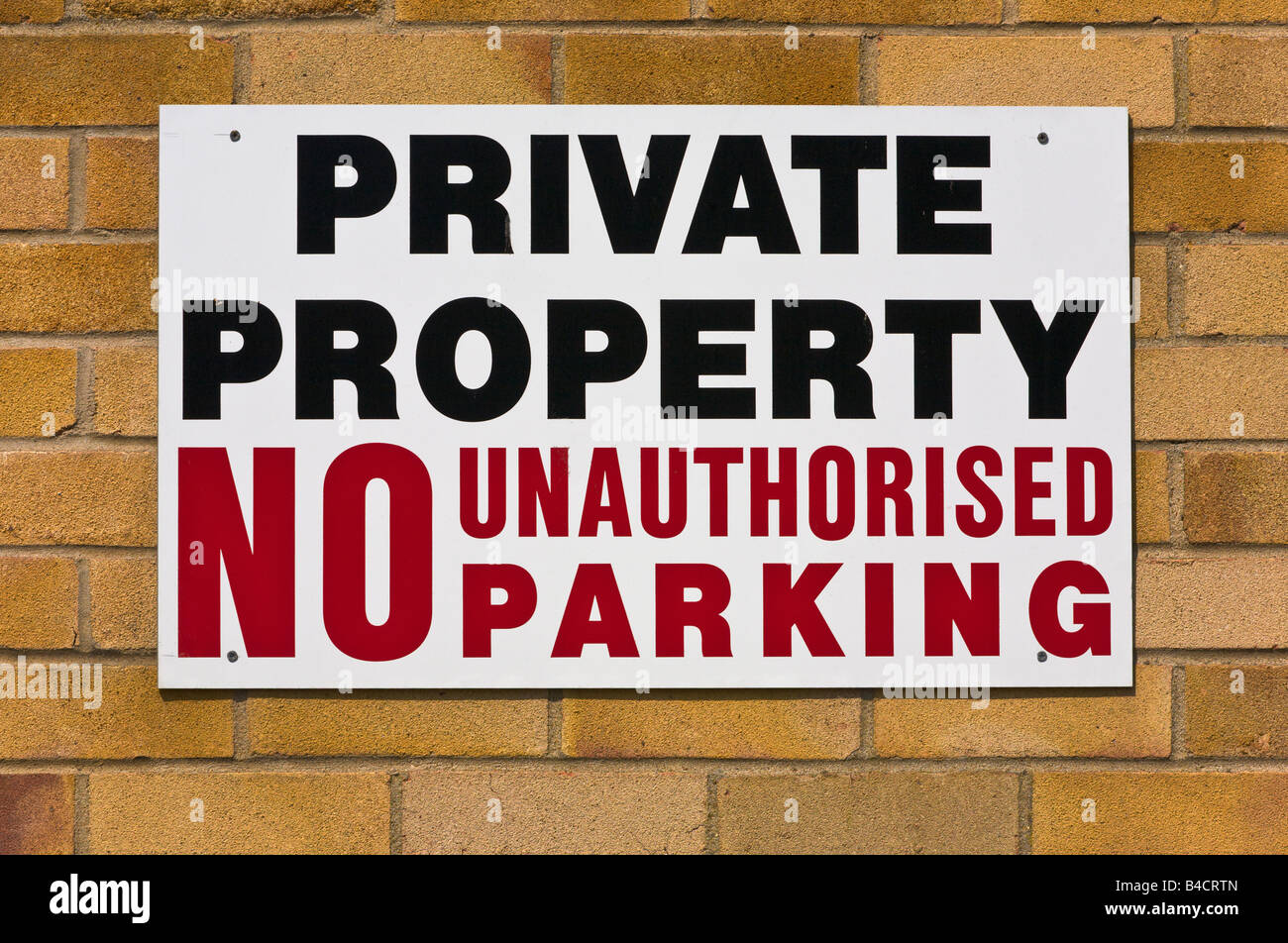 Kein Unbefugter Parkplatz Schild, England Stockfoto