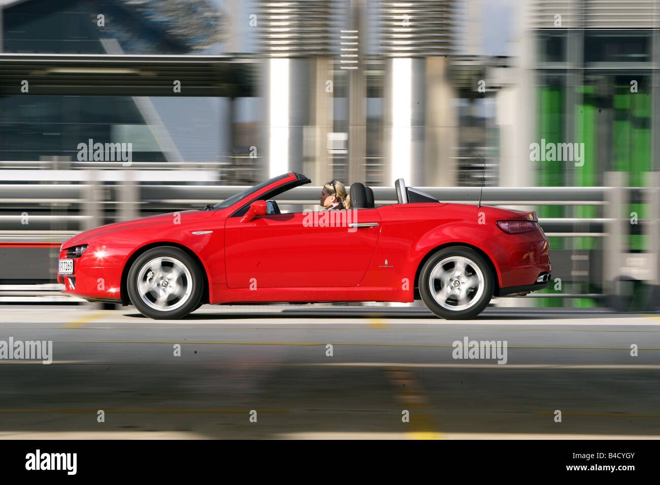 Alfa Romeo Spider 2.2 JTS Exclusive, Modell Jahr 2007-rot, fahren, Seitenansicht, oben offen Stockfoto