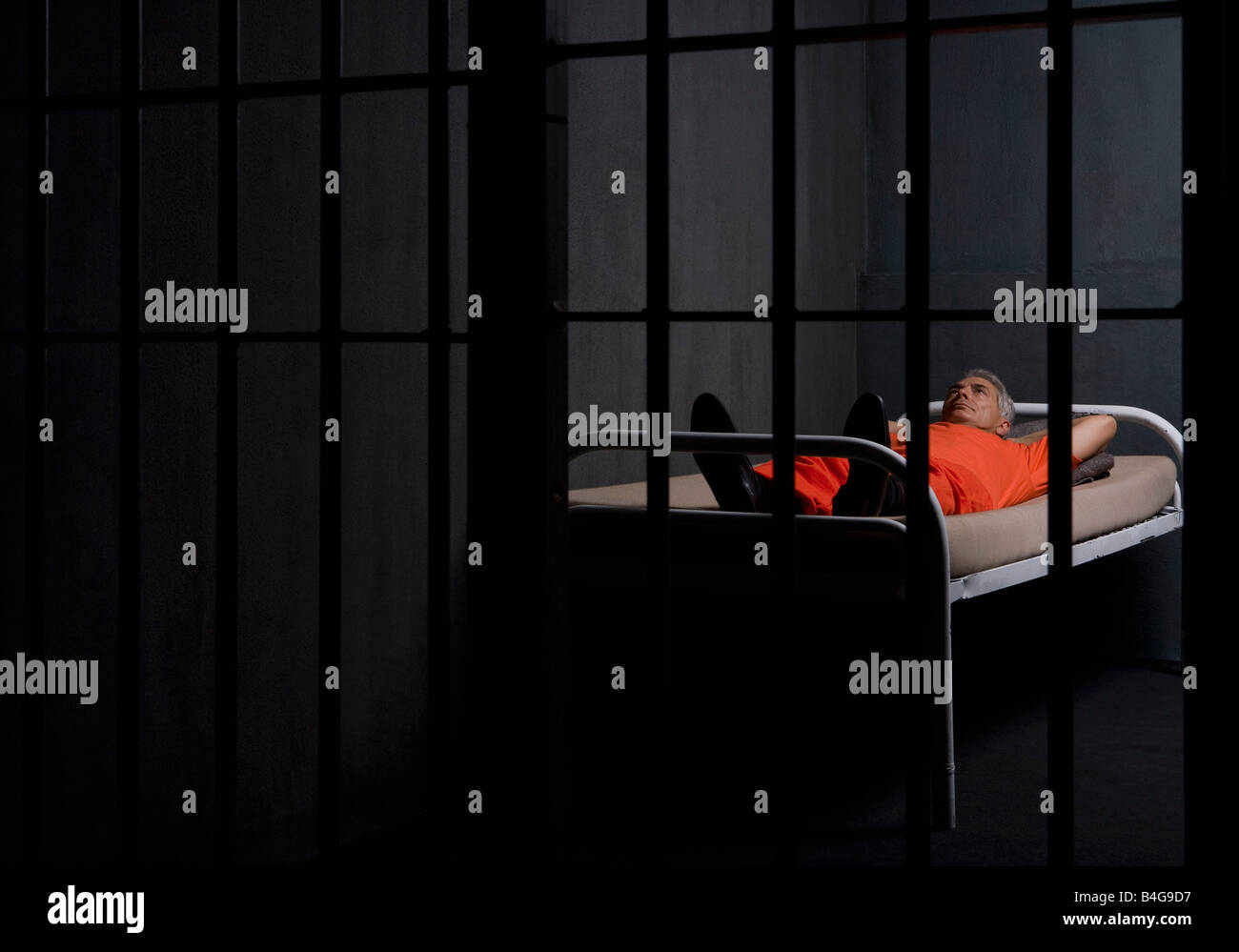 Ein Gefangener in seiner Gefängniszelle Stockfoto