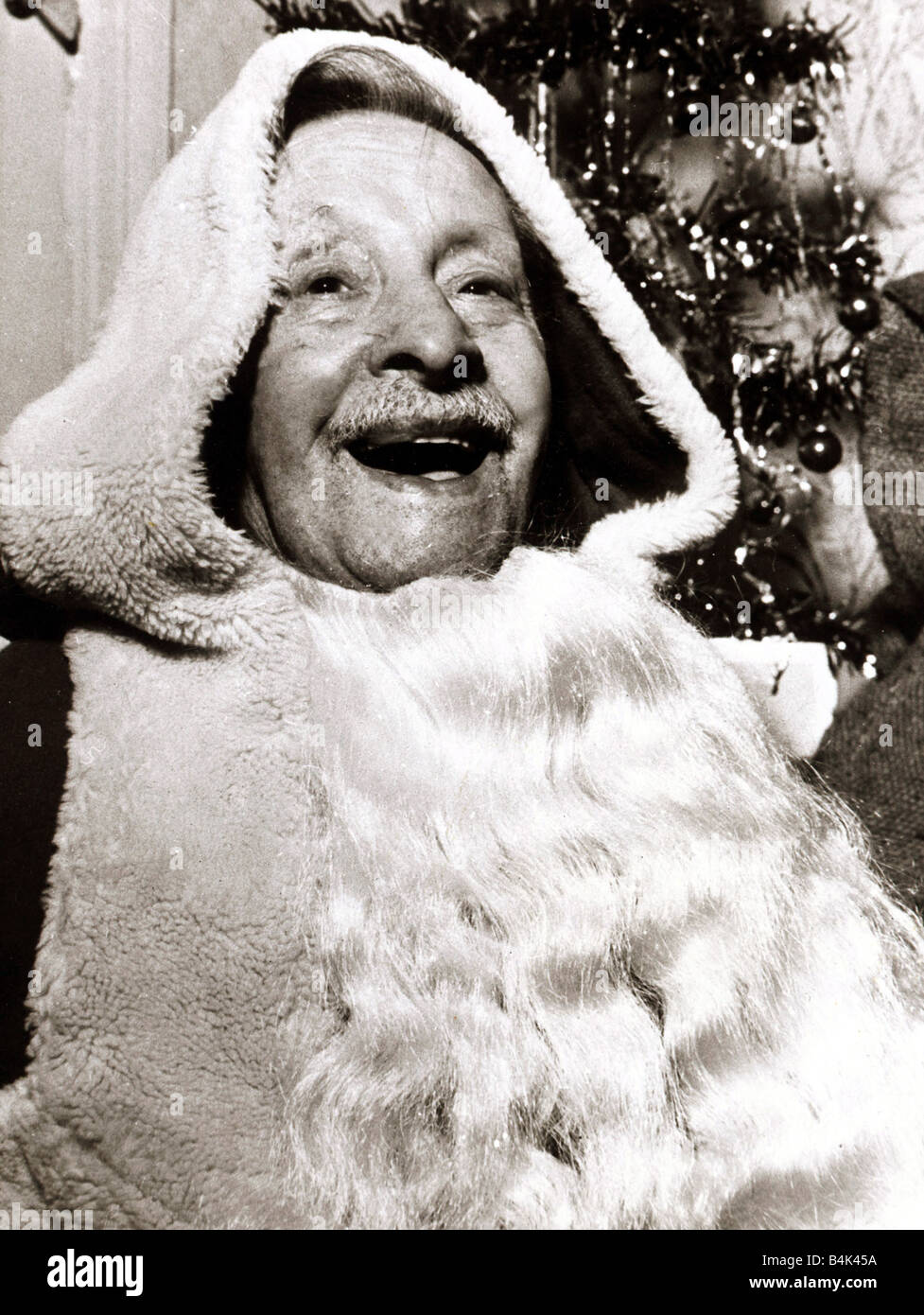 Greis als Weihnachtsmann verkleidet, um 1950 Stockfoto