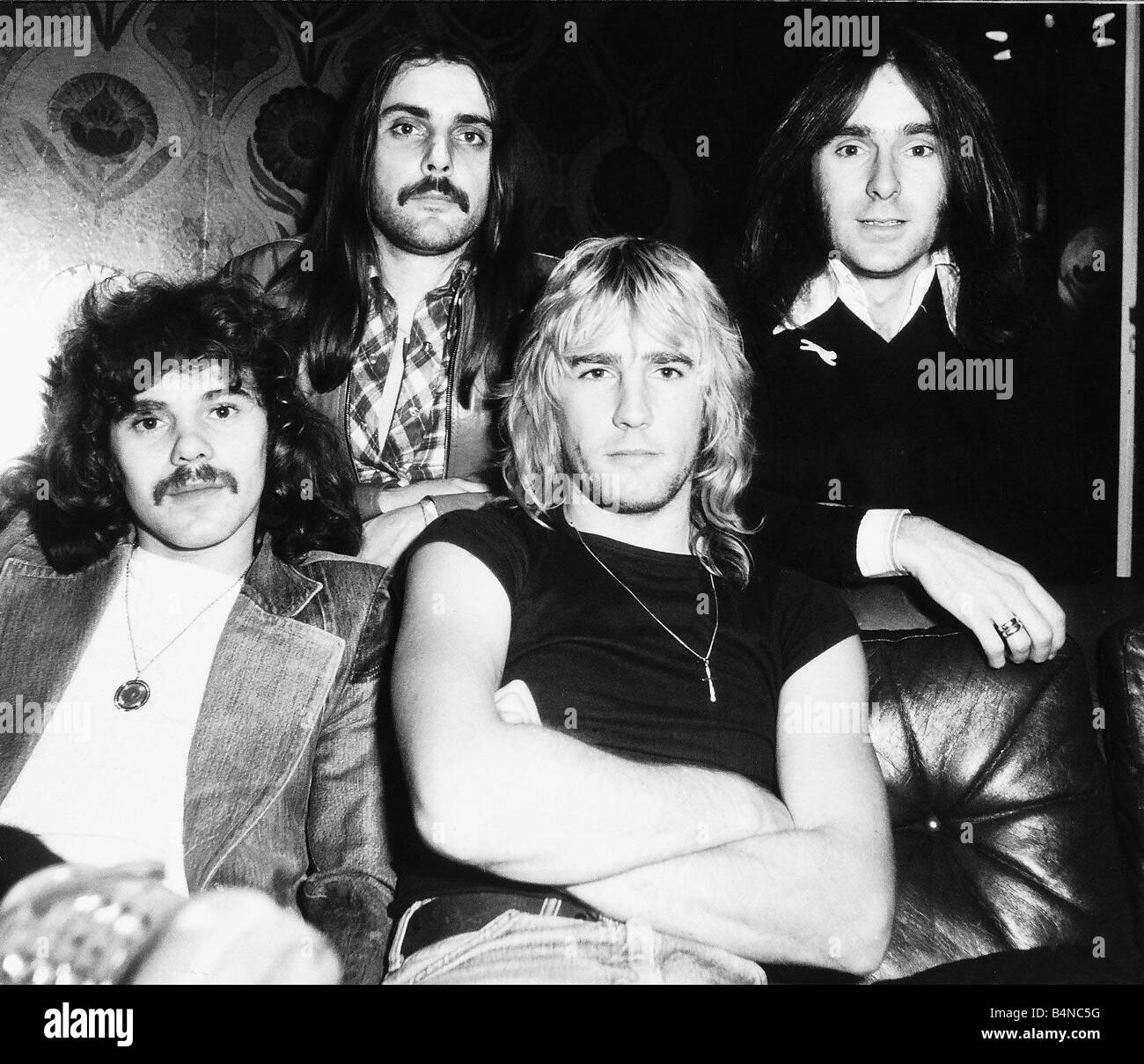 Die Rockgruppe Status Quo feiern ihr 10-jähriges Jubiläum im Geschäft ihre Spielweise brachte sie unzählige Auszeichnungen und eine Legion von rauen harten Fans Stockfoto