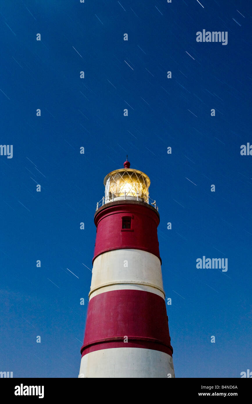 Happisburgh Leuchtturm fotografiert nachts während einer Langzeitbelichtung an der Küste von Norfolk Stockfoto